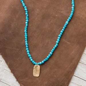 Bronze Tab Necklace on Turquoise Nugget Strand