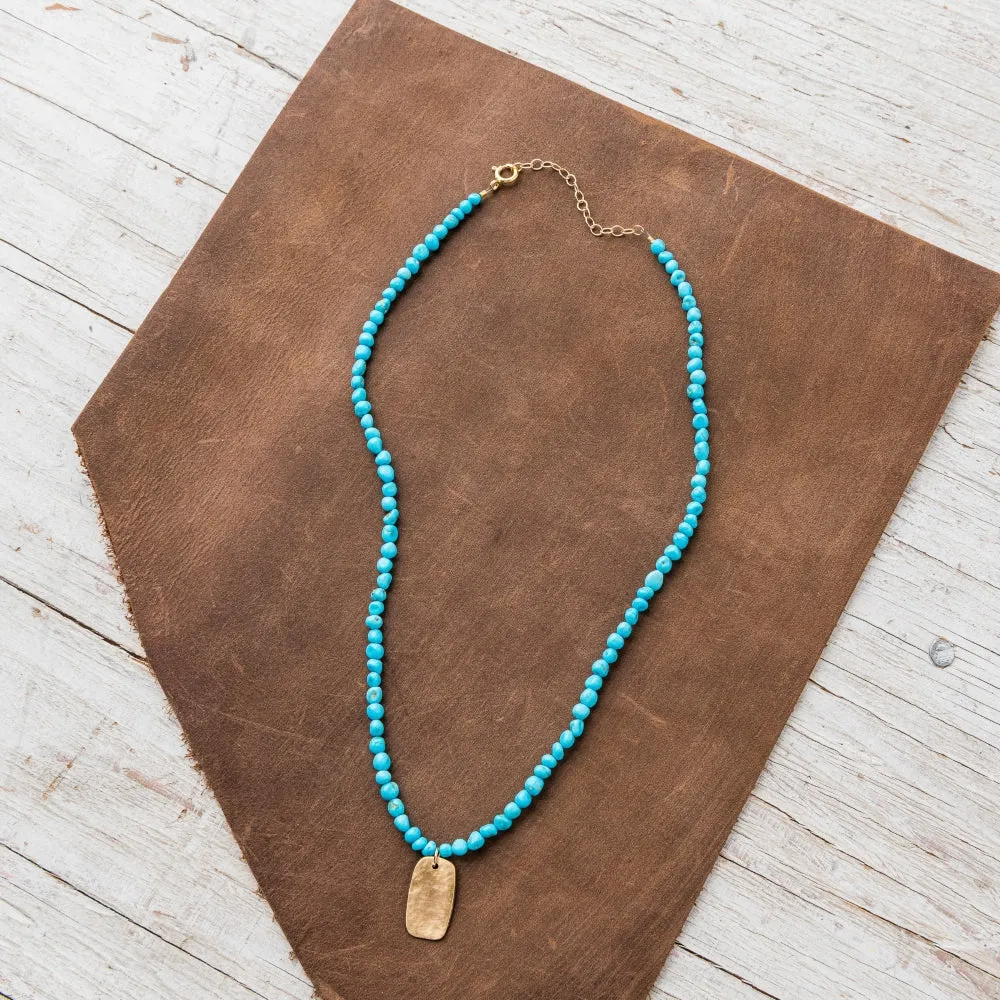 Bronze Tab Necklace on Turquoise Nugget Strand