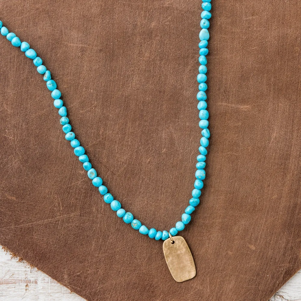 Bronze Tab Necklace on Turquoise Nugget Strand