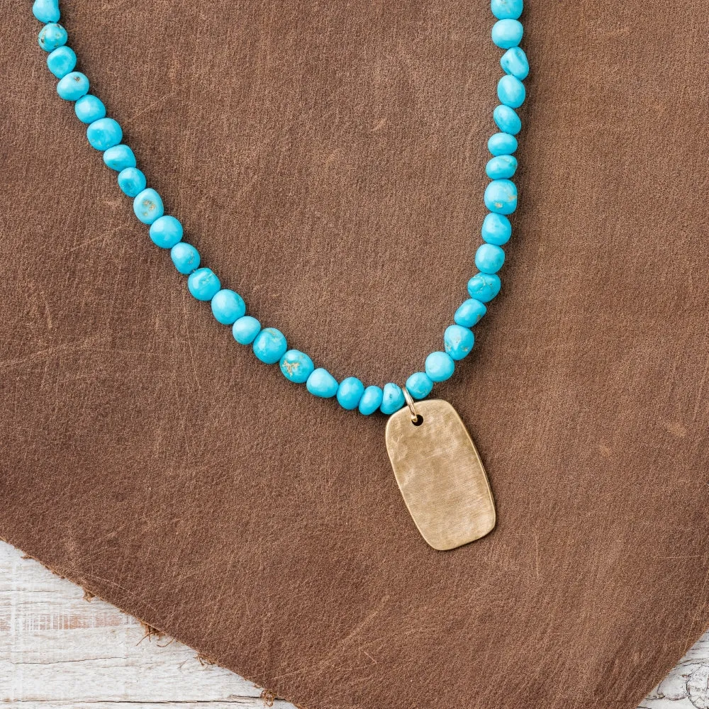 Bronze Tab Necklace on Turquoise Nugget Strand